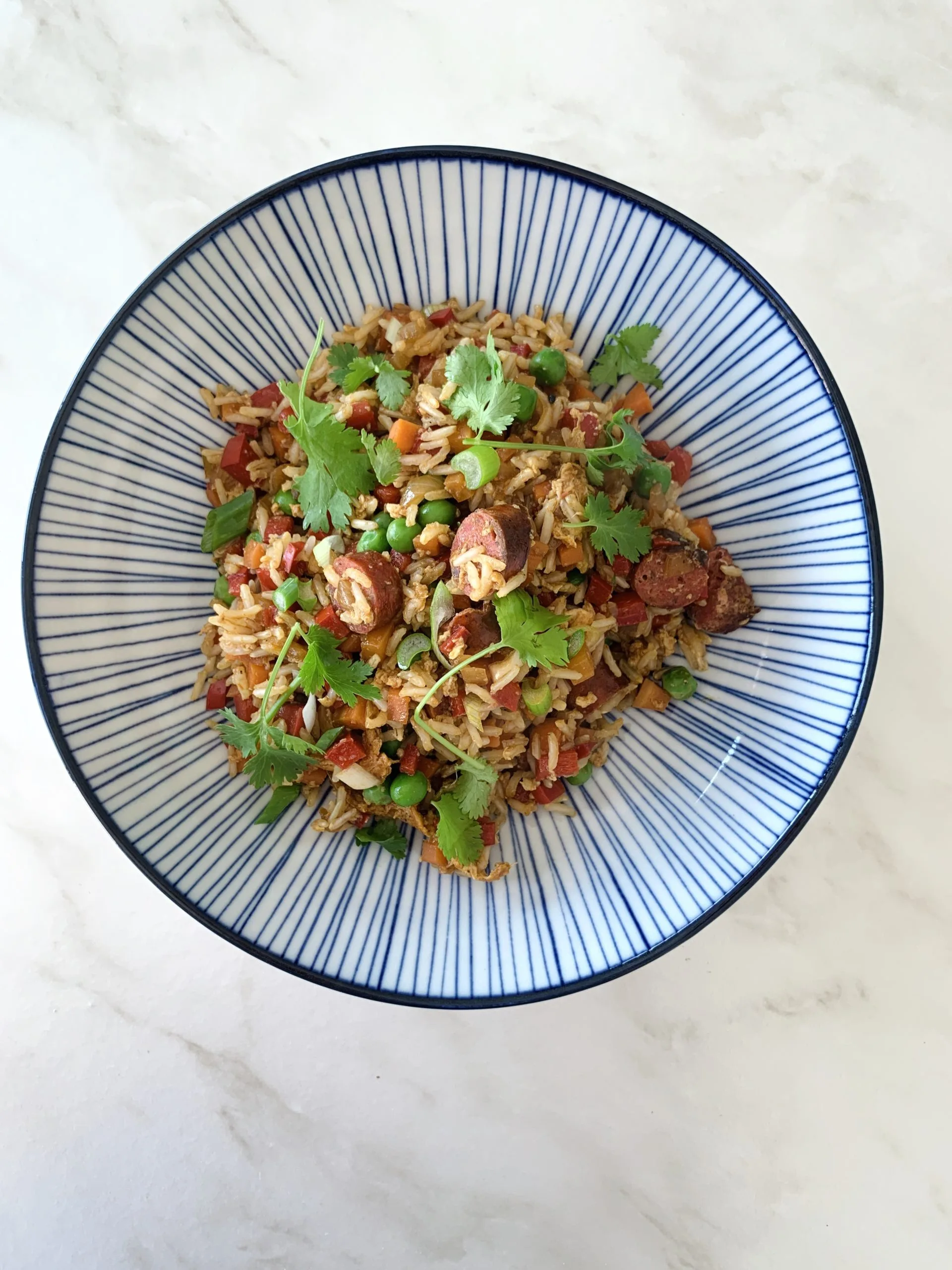 Riz sauté aux merguez façon Cyril Lignac